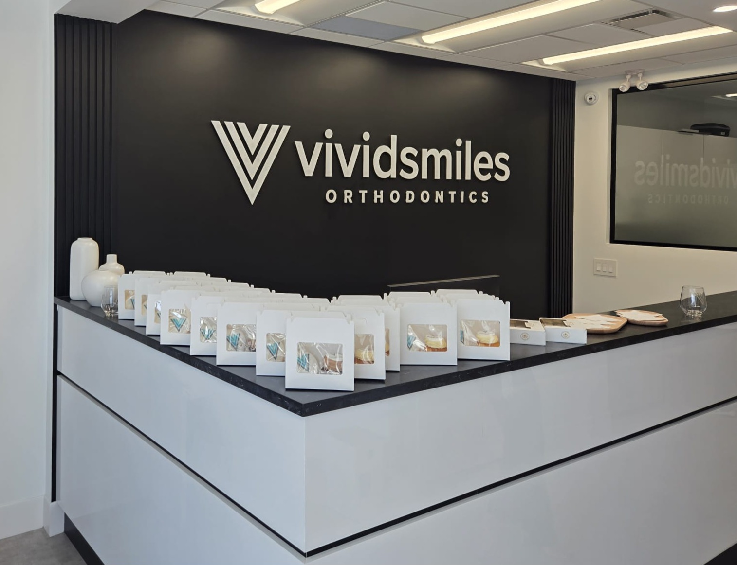 Patient gift bags displayed at Vivid Smiles Orthodontics